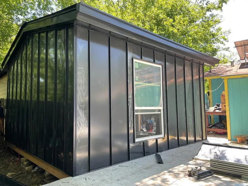 Black standing seam metal wall panels for Metal Roof Installation in Bay Minette